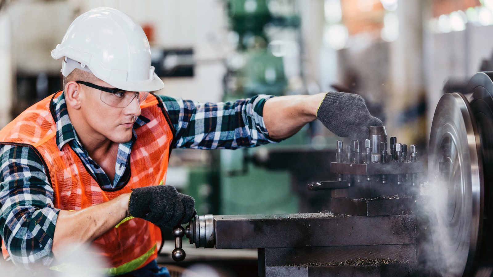 engineer-metalworker-working-on-lathe-machine-at-f-2021-09-01-16-08-26-utc